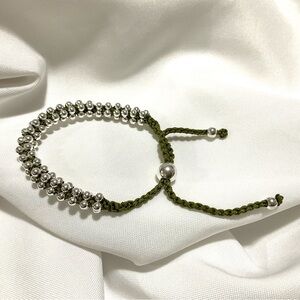 Green & Silver colored Adjustable Friendship Bracelet